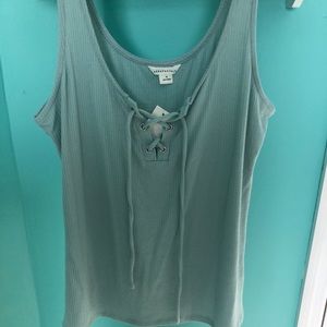 Green/blue top with tie up front
